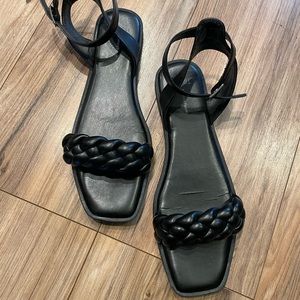 Womens black braided look side buckle sandal. Cute & comfy.